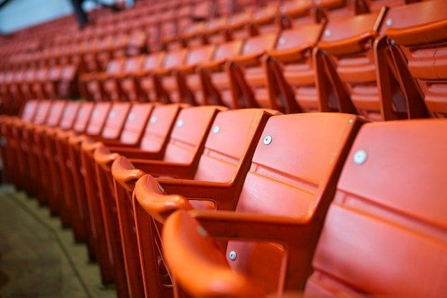 Empty seats at a sporting venue.